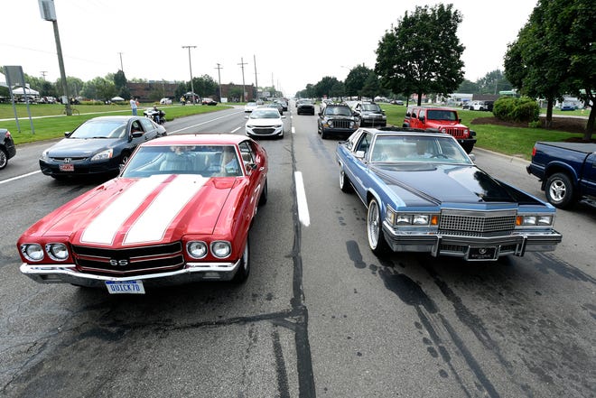 Cruisers head northbound on Gratiot Avenue during the 18th annual Clinton Township Gratiot Cruise, Sunday, Aug. 1, 2021 in Clinton Township, Mich.