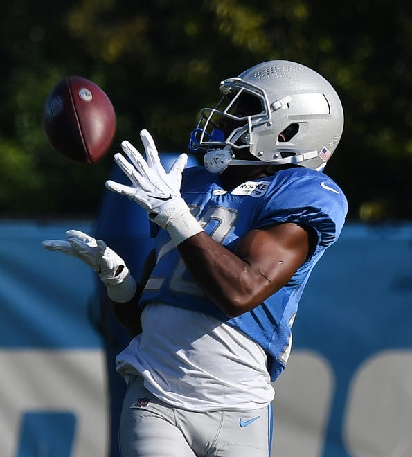 Lions running back Jermar Jefferson readies for a reception during drills.