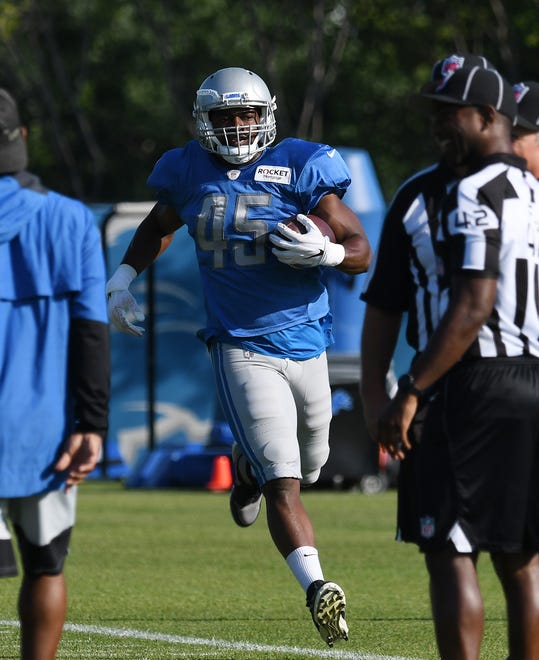 Lions fullback Jason Cabinda after a reception during drills.
