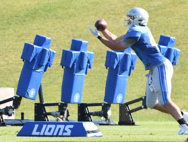 Lions tight end Hunter Thedford readies for a reception during drills.