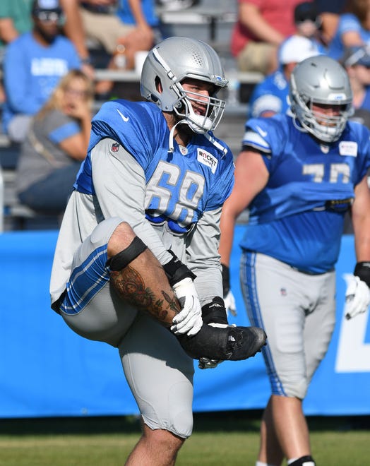 Lions tackle Taylor Decker stretches out during warm-ups.
