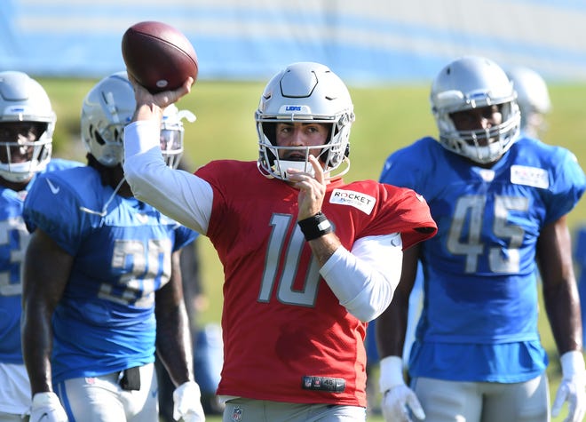 Lions quarterback David Blough looks for his receiver during drills.