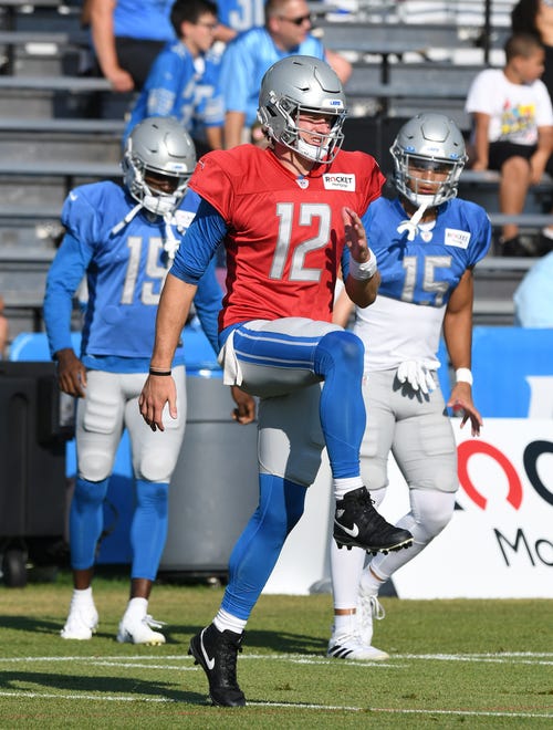 Lions quarterback Tim Boyle stretches out during warm-ups.