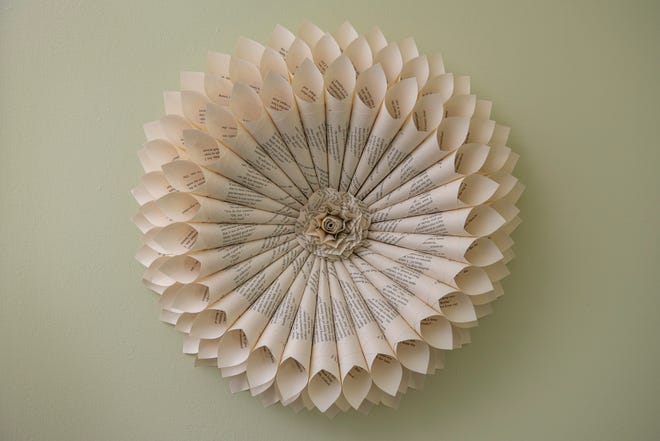 A paper wreath in the guest room was made from repurposed book pages by Bowman’s sister, Shirley Yee who also makes other paper creations.