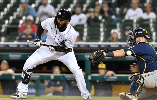 Tigers' Niko Goodrum is out on a foul bunt in the tenth inning.