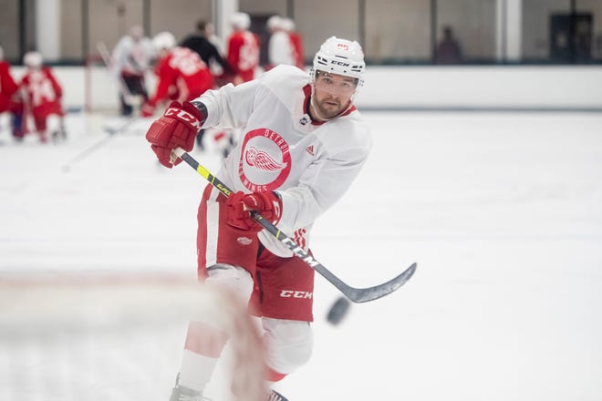 Defenseman Adam Brubacher shoots the puck during Red Wings training camp.
