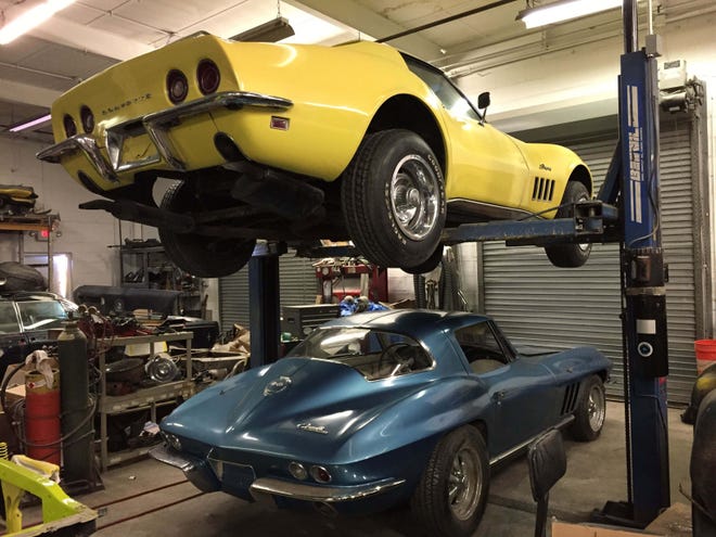 Lost Corvettes under restoration before their are given away to Sweepstakes ticket holders.