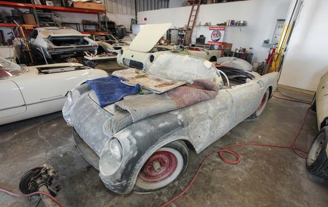 A Corvette undergoes restoration as part of the Lost Corvettes project to benefit ill veterans.