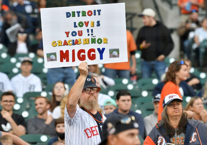A fan holds up a sign during a special pregame ceremony celebrating Miguel Cabrera and his journey to 500 home run.