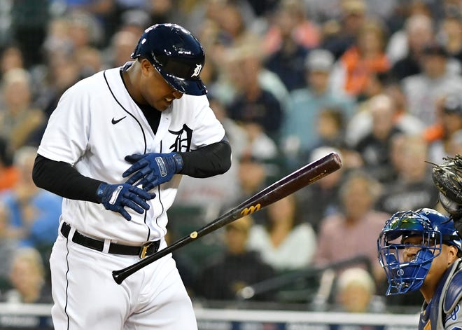 Tigers’ Jonathan Schoop reacts after being hit by a pitch in the first inning.   Detroit Tigers vs Kansas City Royals at Comerica Park in Detroit on Sept. 24, 2021.