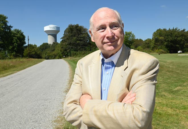Mayor of Haywood County, David M. Livingston, 66, stands in front of the water tower that will support Ford Motor Company ' s Blue Oval City campus in west Haywood County, Tennessee.