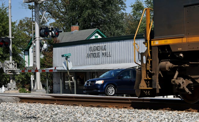 A train rolls through Glendale, Kentucky, on Sept. 27, 2021.