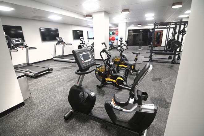 Fitness equipment fills the exercise room at the newly renovated Albert Kahn Building in Detroit on October 6, 2021.