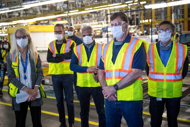 Ford’s incoming CEO Jim Farley listens during a presentation during a plant tour at the Ford Dearborn Truck Plant in Dearborn, Mich. on Sept. 25, 2020.