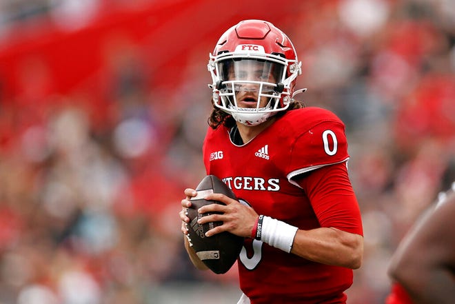 Rutgers quarterback Noah Vedral looks to pass against Michigan State during the first half.