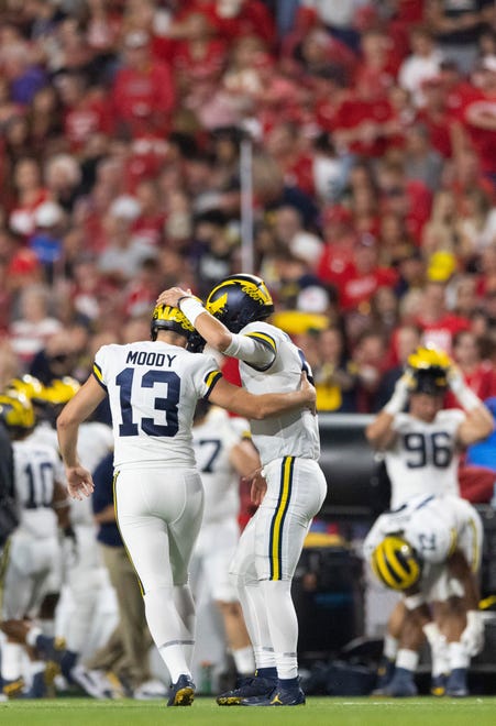 Michigan's Jake Moody (13) celebrates with holder J.J. McCarthy after kicking a field goal against Nebraska during the first half.