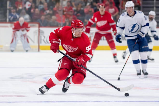 Red Wings center Vladislav Namestnikov moves the puck up the ice during the first period.