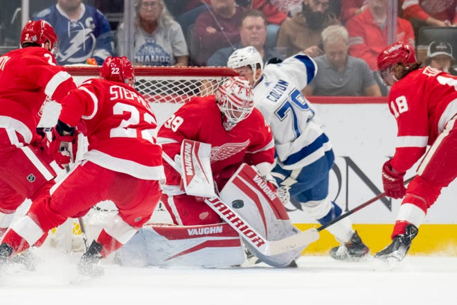 Red Wings goaltender Alex Nedeljkovic makes a save during the first period.
