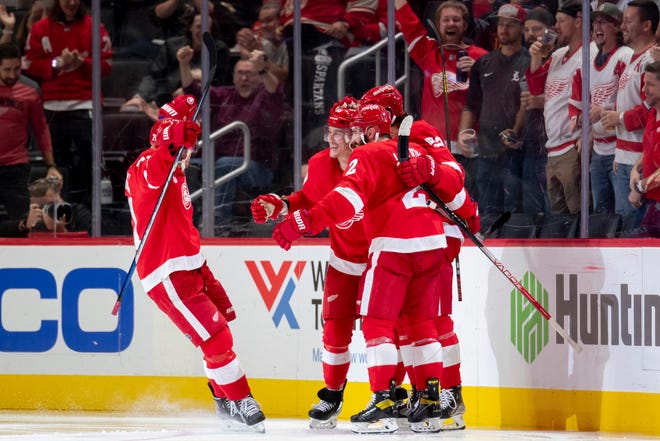 The Red Wings celebrate a goal by left wing Tyler Bertuzzi during the second period.