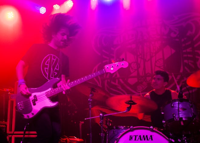 Touche’ Amore’ bassist Tyler Kirby and drummer Elliot Babin perform.