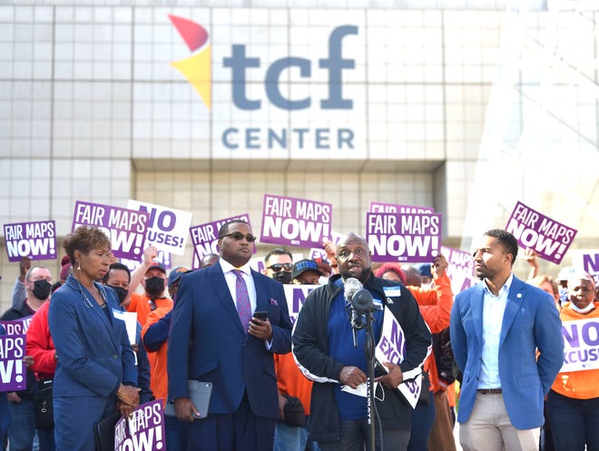 (L-R): Yvette McElroy Anderson, of Detroit, Fannie Lou Hamer Political Action Committee community field director, Wayne County Commissioner Jonathan Kinloch, of Detroit, Rick Blocker, of Southfield, 14th District Democratic Party chairperson and State Senator Adam Hollier, address members of the media in front of the TCF Center, Wednesday afternoon, October 20, 2021, before the event.