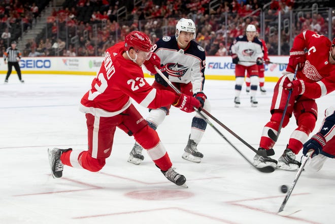 Detroit left wing Lucas Raymond scores a goal during the third period of a game between the Detroit Red Wings and the Columbus Blue Jackets at Little Caesars Arena, in Detroit, October 19, 2021.