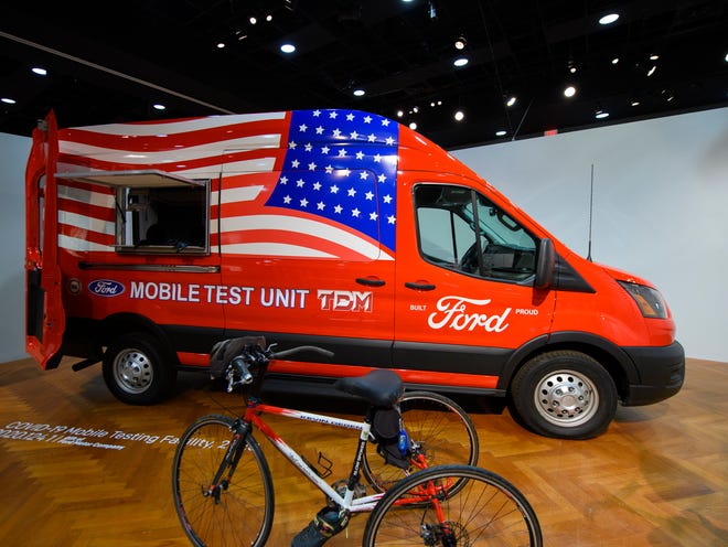 A Ford Transit van converted for use as a Mobile Test Unit is on display with a custom tricycle on display at a new exhibit at the Henry Ford Museum  "Collecting Mobility: New Objects, New Stories.", Wednesday, Oct. 20, 2021.