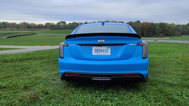 A Caddy for sure. The distinctive rear view of the 2022 Cadillac CT5-V Blackwing includes vertical tailights and quad pipes.
