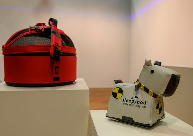 "Max 2" a crash test dog, was from 2012, was used to help test the Sleepypod Pet Carrier, 2019, in a new exhibit at the Henry Ford Museum  "Collecting Mobility: New Objects, New Stories.", Wednesday, Oct. 20, 2021.