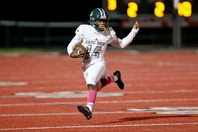Detroit Cass Tech’s Leeshaun Mumpfield (16) runs up the field during their high school football game against Orchard Lake St. Mary’s on Thursday, October 21, 2021 at Orchard Lake St. Mary's High School in West Bloomfield Township.