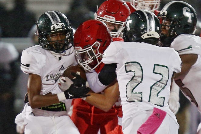 Detroit Cass Tech’s John McIntosh (11) is tackled behind the line of scrimmage during their high school football game against Orchard Lake St. Mary’s on Thursday, October 21, 2021 at Orchard Lake St. Mary's High School in West Bloomfield Township.