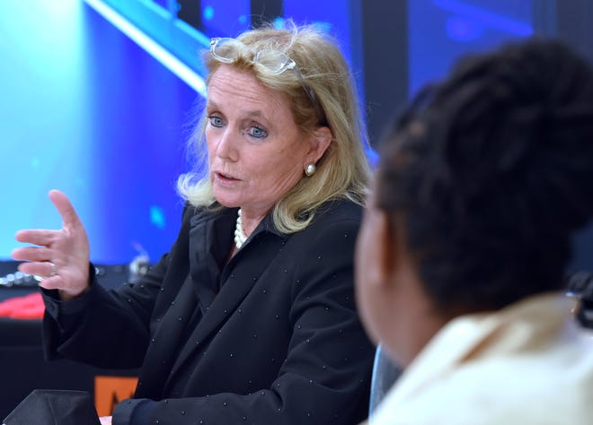 US Congresswoman Debbie Dingell, left, talks with Mothering Justice National Executive Director and Founder Danielle Atkinson during the roundtable meeting, Saturday afternoon October 23, 2021.
