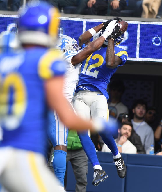 Lions defensive back  Jerry Jacobs can't  stop a touchdown reception by Rams receiver Van Jefferson in the second quarter.