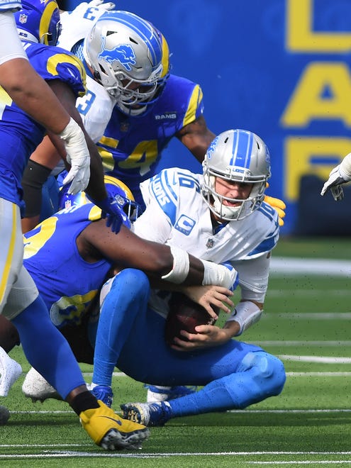 Lions quarterback jared Goff is brought down for a sack in the third quarter.
