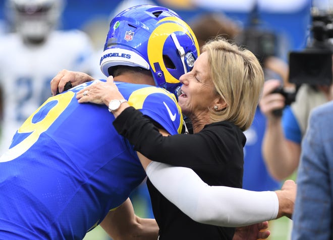 Former Lions quarterback Matthew Stafford comes over to the sidelines and gives Sheila Ford Hamp, Lions principal owner and chair, a hug and exchanged a few words before the game.