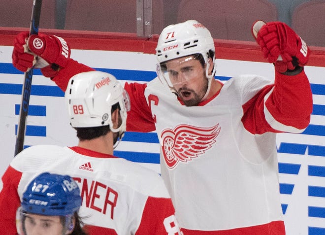 Detroit Red Wings' Dylan Larkin (71) celebrates after scoring against the Montreal Canadiens during the first period.