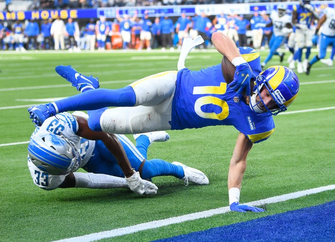 Rams WR Cooper Kupp goes into the end zone over Lions DB Daryl Worley in the fourth quarter for the go-ahead touchdown late in the second half of a 28-19 Los Angeles Rams victory over the Detroit Lions at Sofi Stadium in Los Angeles, California  on October 24, 2021.
