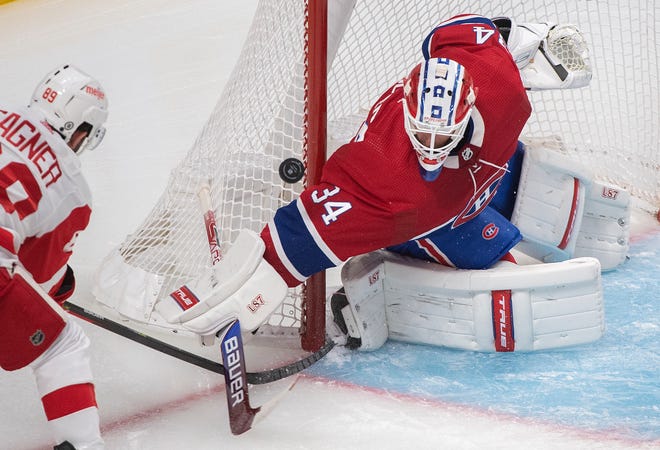 Canadiens goaltender Jake Allen stops Red Wings' Sam Gagner during the second period.