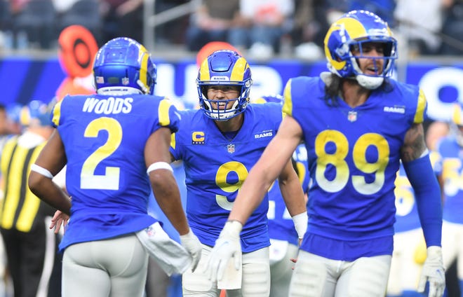 Rams quarterback Matthew Stafford is all smiles after teammate Robert Woods took the ball into the end zone on a two point conversion in the fourth quarter.