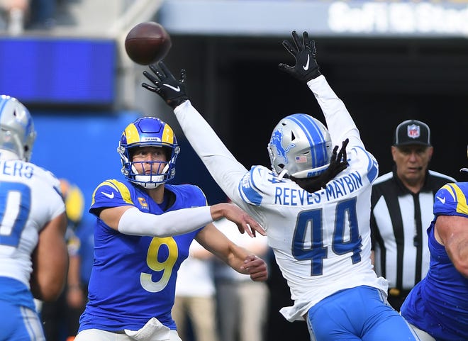 Lions' Jalen Reeves-Maybin tries to block a pass by Rams quarterback Matthew Stafford in the second quarter.