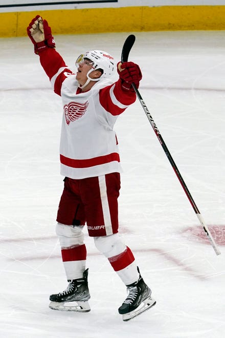 Red Wings rookie Lucas Raymond celebrates his hat trick against the Blackhawks during the third period Sunday, Oct. 24, 2021, in Chicago.