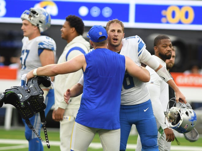 Lions quarterback Jared Goff gets together with some of his former teammates on the Los Angeles Rams after losing 28-19 to Detroit at Sofi Stadium in Los Angeles.