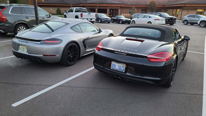 Changes between the 2021 Porsche Cayman GTS and last-gen, 2019 Porsche Cayman/Boxster (right) are small.