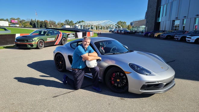 Detroit News auto columnist Henry Payne test drove the 2021 Porsche Cayman GTS at M1 Concourse's Champion Motor Speedway in Pontiac.