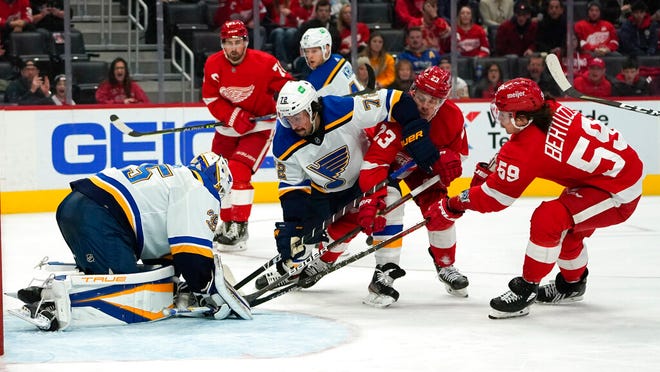 St. Louis Blues goaltender Ville Husso (35) stops Detroit Red Wings left wing Tyler Bertuzzi (59) in the second period of Wednesday's game in Detroit.