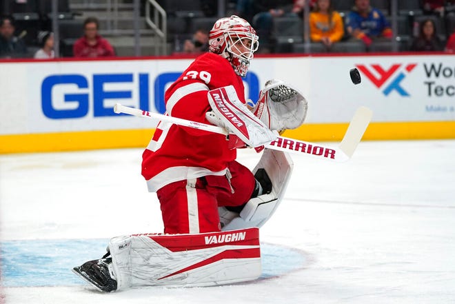 Detroit Red Wings goaltender Alex Nedeljkovic stops a St. Louis Blues shot in the first period of Wednesday's game at Little Caesars Arena in Detroit.