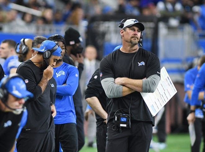 Lions head coach Dan Campbell watches the final minutes of the fourth quarter slip away in a 16-14 loss to Chicago.