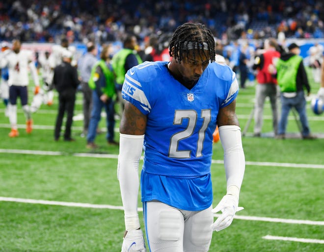 Lions' Tracy Walker walks off the field after a 16-14 loss to the Chicago Bears on a walk off field goal.