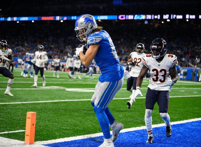 Lions tight end T.J. Hockenson backs steps into the end zone for a touchdown in the third quarter