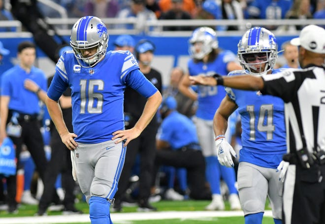 Lions quarterback Jared Goff (16) reacts after a penalty by the Lions in the fourth quarter.